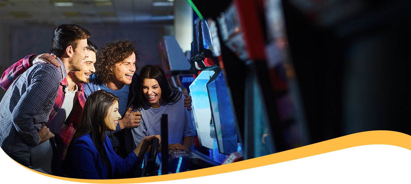 people having fun at the Starland video game arcade