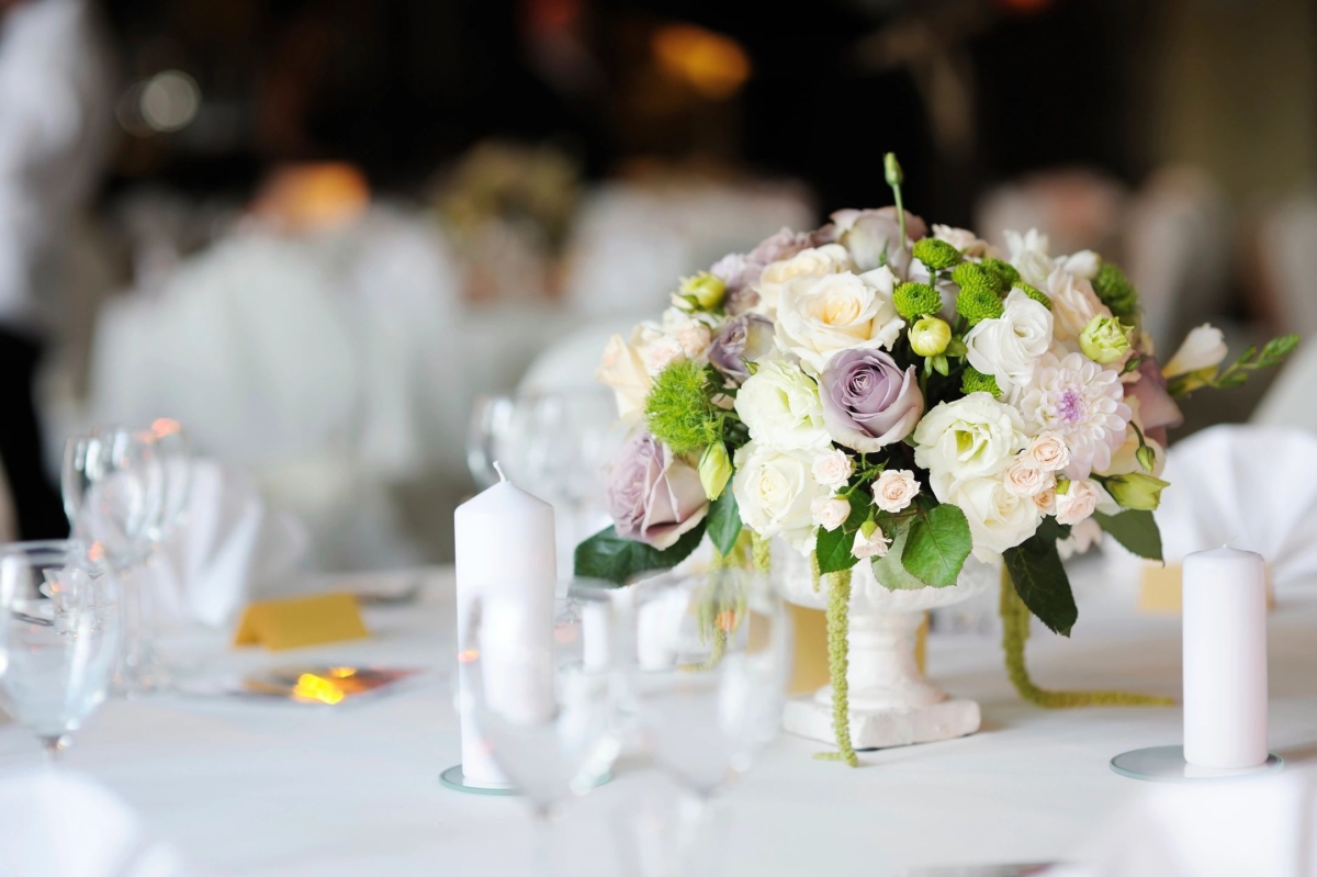 able set for event with bouquet of flowers