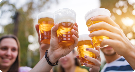 cheers with cups of beer